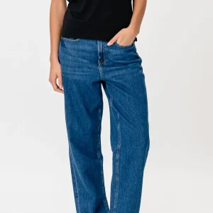 El rendimiento original de los jeans sueltos - mezclilla azul medio